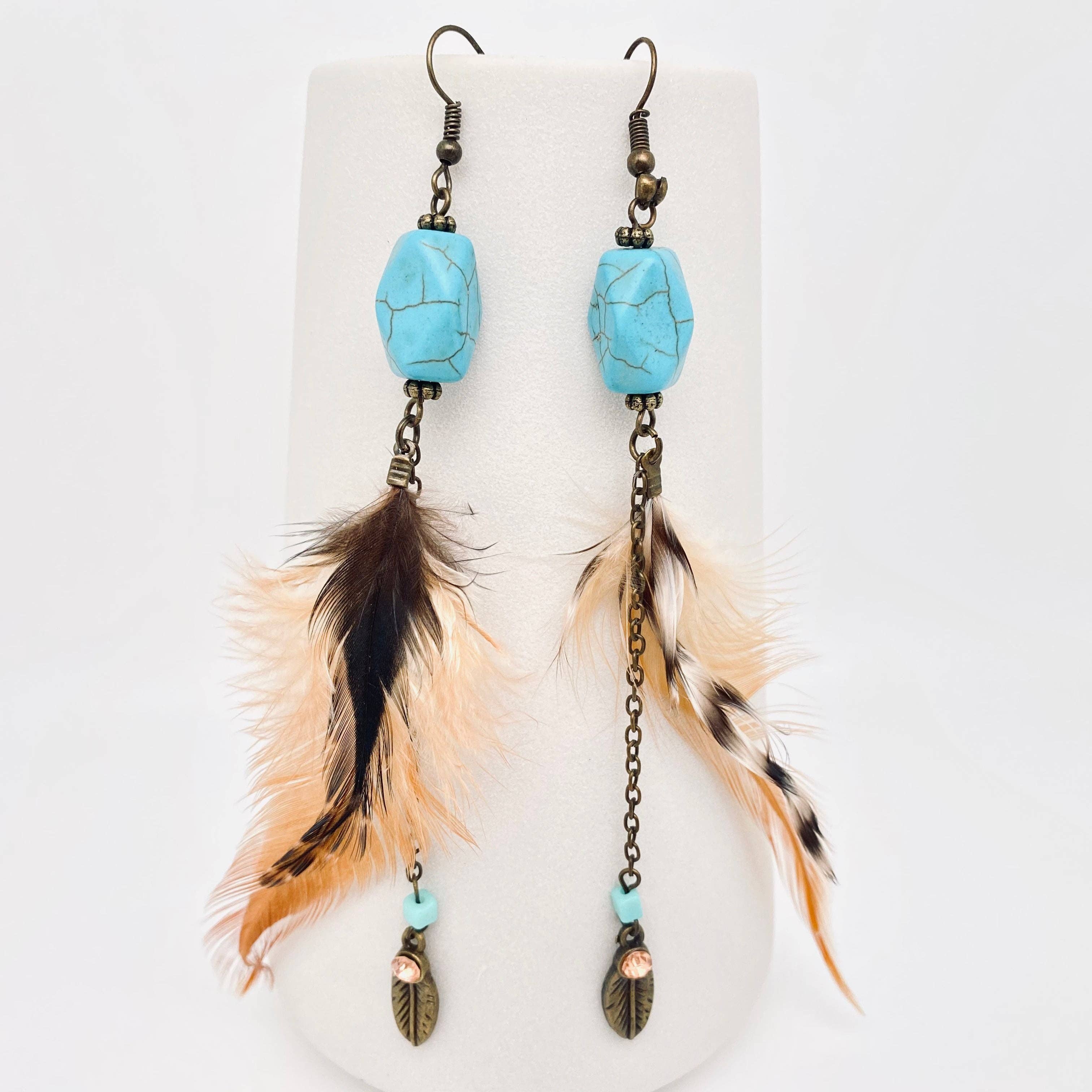 Share more than 179 metal feather earrings latest